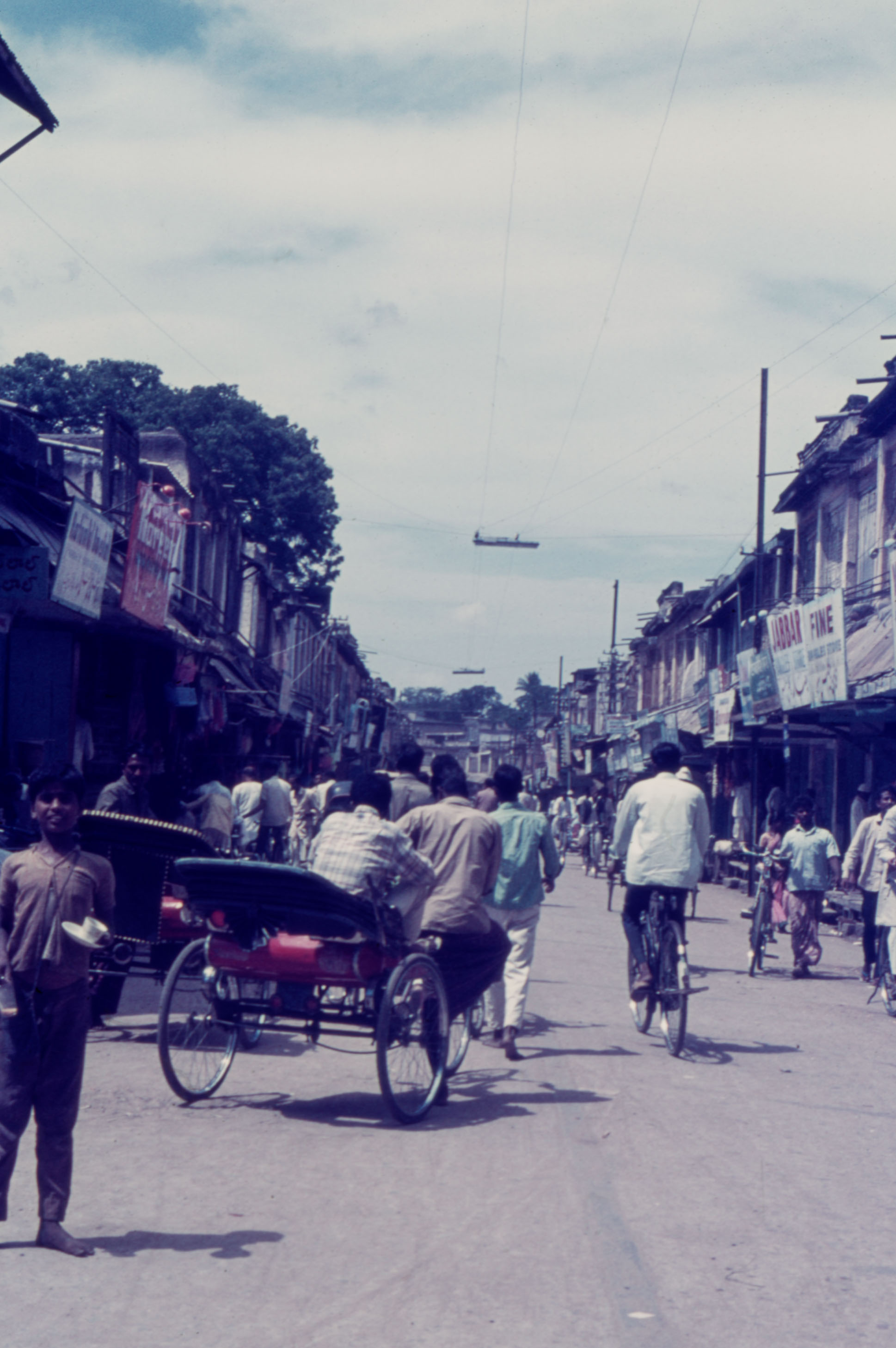 Busy street with Rickshaws