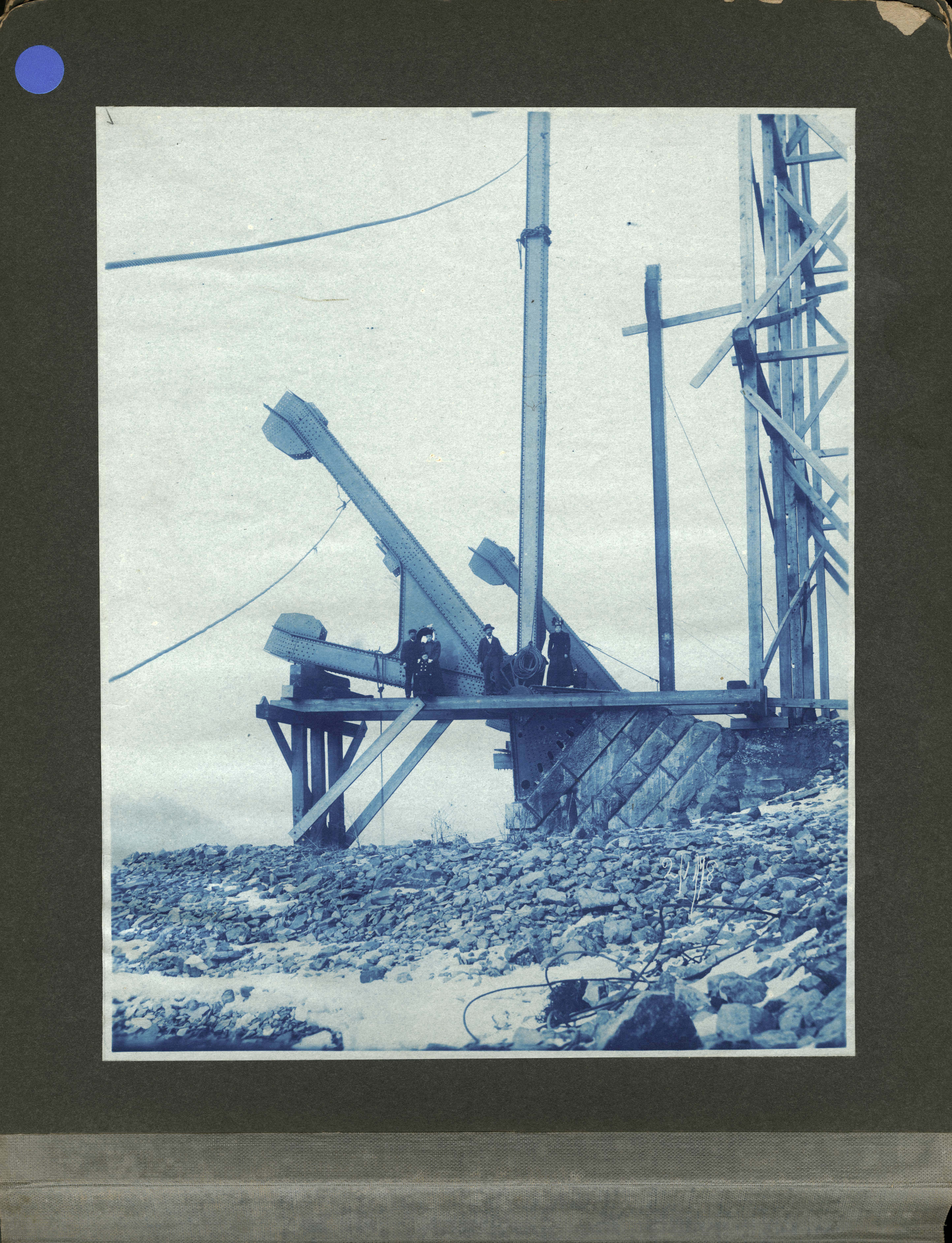 Group of people standing by abutments for bridge
