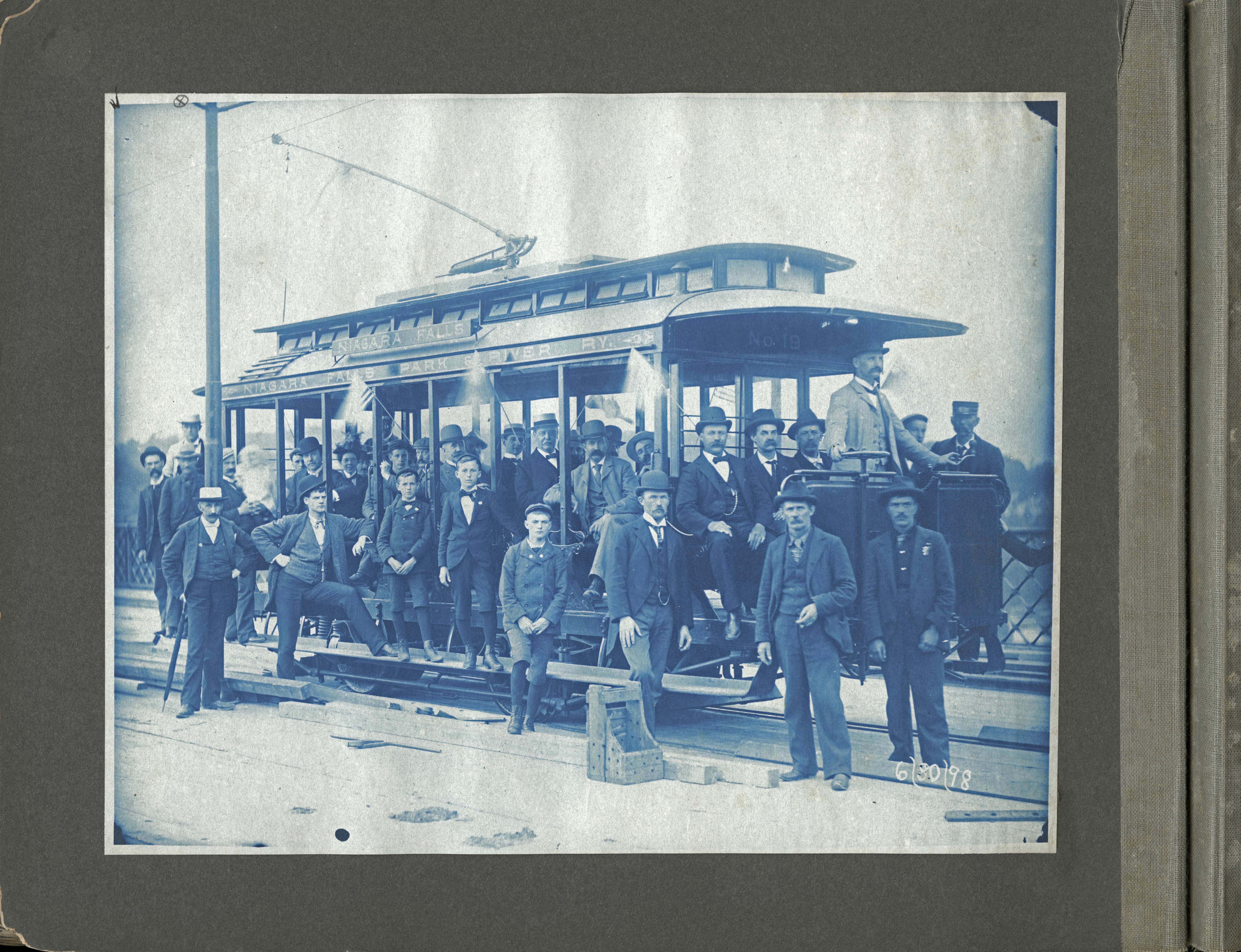 Electric streetcar with people